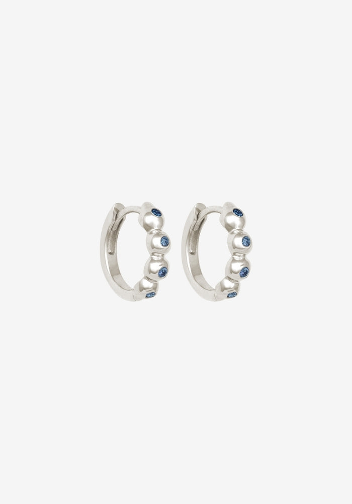 TEMPLE OF THE SUN Ayana Huggies Topaz Silver
